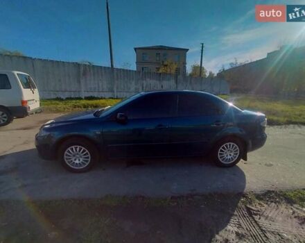Синий Мазда 6, объемом двигателя 1.8 л и пробегом 200 тыс. км за 5600 $, фото 2 на Automoto.ua