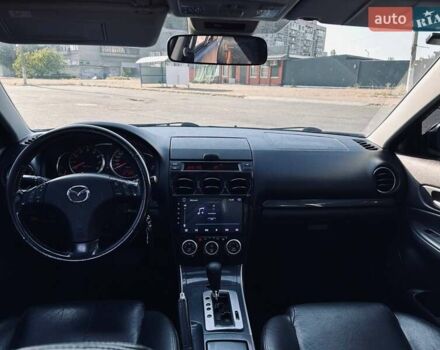 Синий Мазда 6, объемом двигателя 2 л и пробегом 300 тыс. км за 6600 $, фото 2 на Automoto.ua