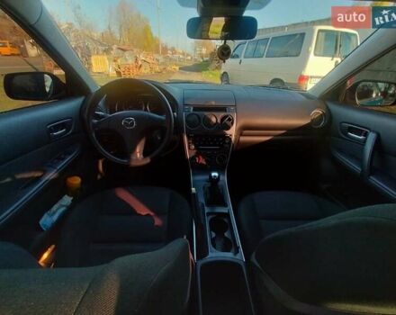 Синий Мазда 6, объемом двигателя 1.8 л и пробегом 200 тыс. км за 5600 $, фото 5 на Automoto.ua