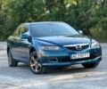 Синий Мазда 6, объемом двигателя 1.8 л и пробегом 299 тыс. км за 4200 $, фото 2 на Automoto.ua