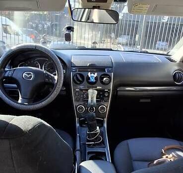 Синій Мазда 6, об'ємом двигуна 1.8 л та пробігом 248 тис. км за 4200 $, фото 7 на Automoto.ua