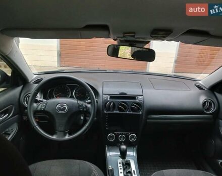 Синий Мазда 6, объемом двигателя 2 л и пробегом 253 тыс. км за 5300 $, фото 1 на Automoto.ua
