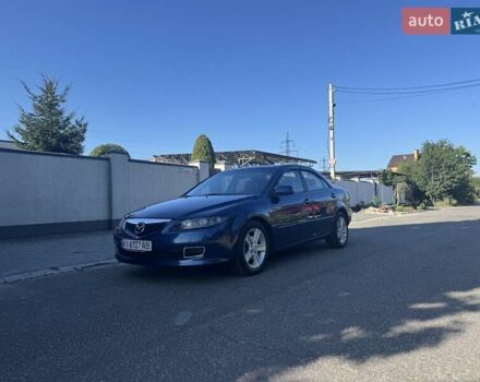 Синій Мазда 6, об'ємом двигуна 2 л та пробігом 216 тис. км за 5600 $, фото 1 на Automoto.ua
