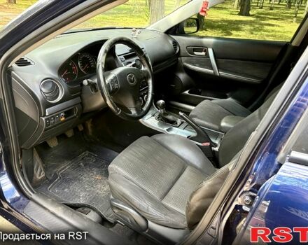 Синій Мазда 6, об'ємом двигуна 2.3 л та пробігом 177 тис. км за 3850 $, фото 4 на Automoto.ua