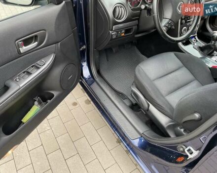 Синий Мазда 6, объемом двигателя 1.8 л и пробегом 211 тыс. км за 5500 $, фото 11 на Automoto.ua