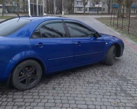 Синій Мазда 6, об'ємом двигуна 2 л та пробігом 270 тис. км за 4700 $, фото 5 на Automoto.ua