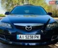 Синий Мазда 6, объемом двигателя 2 л и пробегом 245 тыс. км за 5300 $, фото 1 на Automoto.ua