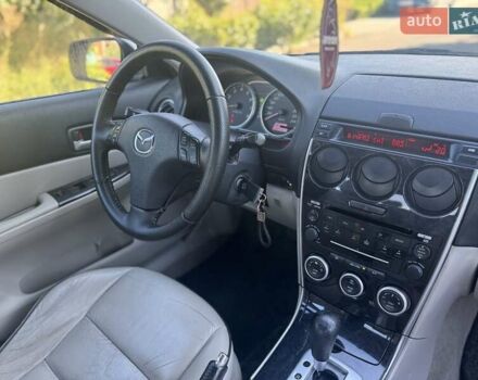 Синій Мазда 6, об'ємом двигуна 2 л та пробігом 216 тис. км за 5600 $, фото 4 на Automoto.ua