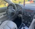 Синій Мазда 6, об'ємом двигуна 2 л та пробігом 216 тис. км за 5600 $, фото 4 на Automoto.ua