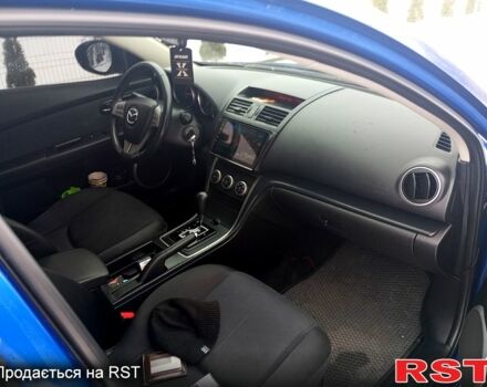 Синий Мазда 6, объемом двигателя 2 л и пробегом 318 тыс. км за 6350 $, фото 7 на Automoto.ua
