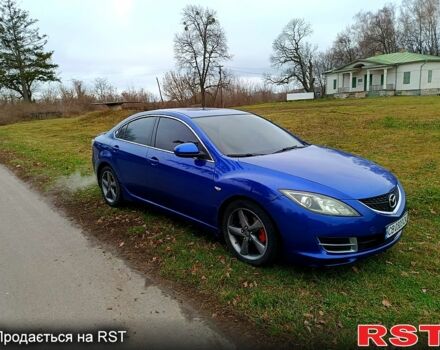 Синий Мазда 6, объемом двигателя 2 л и пробегом 318 тыс. км за 6350 $, фото 2 на Automoto.ua