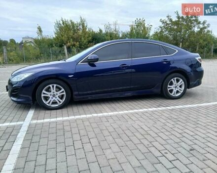 Синий Мазда 6, объемом двигателя 2.2 л и пробегом 250 тыс. км за 7300 $, фото 2 на Automoto.ua