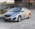 Синий Мазда 6, объемом двигателя 1.8 л и пробегом 247 тыс. км за 7500 $, фото 1 на Automoto.ua