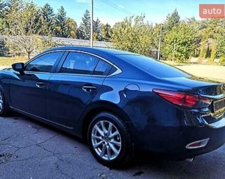 Синий Мазда 6, объемом двигателя 2 л и пробегом 165 тыс. км за 12000 $, фото 1 на Automoto.ua