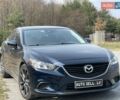Синій Мазда 6, об'ємом двигуна 2.49 л та пробігом 90 тис. км за 14000 $, фото 1 на Automoto.ua