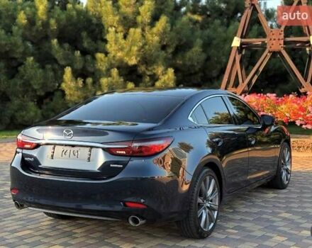 Синий Мазда 6, объемом двигателя 2.49 л и пробегом 96 тыс. км за 16000 $, фото 1 на Automoto.ua
