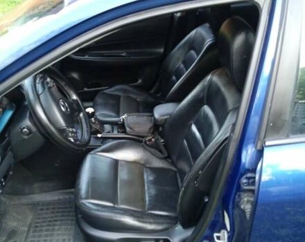 Синий Мазда 6, объемом двигателя 2 л и пробегом 443 тыс. км за 4700 $, фото 2 на Automoto.ua