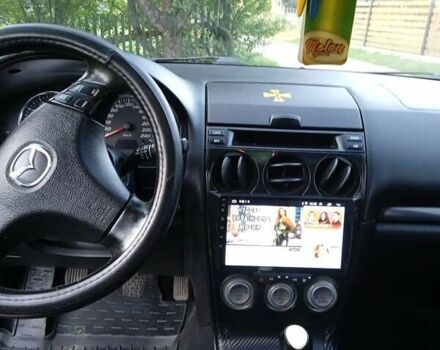 Синий Мазда 6, объемом двигателя 2 л и пробегом 443 тыс. км за 4700 $, фото 5 на Automoto.ua