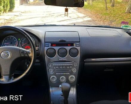 Синий Мазда 6, объемом двигателя 2 л и пробегом 274 тыс. км за 4400 $, фото 6 на Automoto.ua