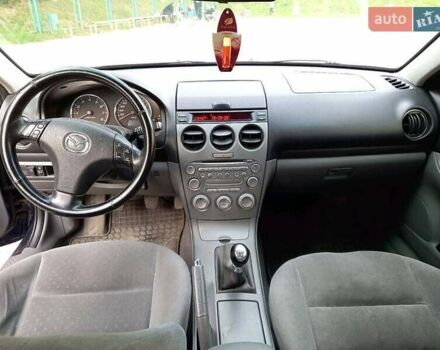 Синий Мазда 6, объемом двигателя 1.8 л и пробегом 295 тыс. км за 4800 $, фото 2 на Automoto.ua