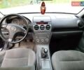 Синий Мазда 6, объемом двигателя 1.8 л и пробегом 295 тыс. км за 4800 $, фото 2 на Automoto.ua