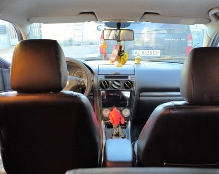 Синій Мазда 6, об'ємом двигуна 2 л та пробігом 321 тис. км за 5300 $, фото 2 на Automoto.ua