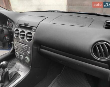 Синій Мазда 6, об'ємом двигуна 1.8 л та пробігом 285 тис. км за 3750 $, фото 12 на Automoto.ua