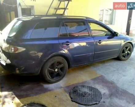 Синий Мазда 6, объемом двигателя 2 л и пробегом 250 тыс. км за 4200 $, фото 1 на Automoto.ua
