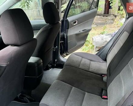 Синий Мазда 6, объемом двигателя 2 л и пробегом 348 тыс. км за 3300 $, фото 18 на Automoto.ua