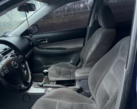 Синий Мазда 6, объемом двигателя 2 л и пробегом 417 тыс. км за 4050 $, фото 11 на Automoto.ua