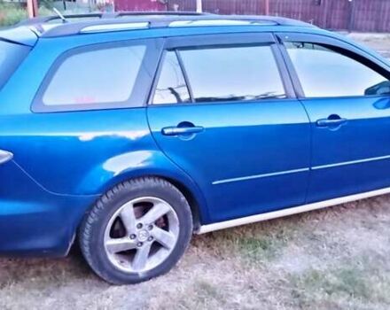 Синий Мазда 6, объемом двигателя 2 л и пробегом 245 тыс. км за 4200 $, фото 4 на Automoto.ua