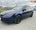 Синий Мазда 6, объемом двигателя 2 л и пробегом 290 тыс. км за 3400 $, фото 1 на Automoto.ua