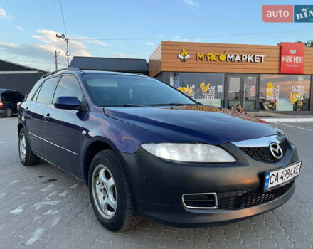 Синий Мазда 6, объемом двигателя 2 л и пробегом 243 тыс. км за 2399 $, фото 1 на Automoto.ua