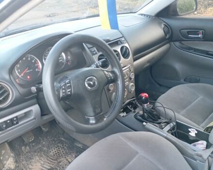 Синий Мазда 6, объемом двигателя 2 л и пробегом 377 тыс. км за 1950 $, фото 5 на Automoto.ua