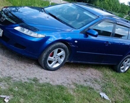 Синий Мазда 6, объемом двигателя 2 л и пробегом 255 тыс. км за 4200 $, фото 2 на Automoto.ua