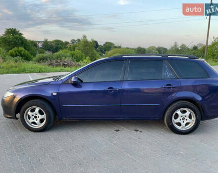 Синий Мазда 6, объемом двигателя 2 л и пробегом 243 тыс. км за 2399 $, фото 4 на Automoto.ua