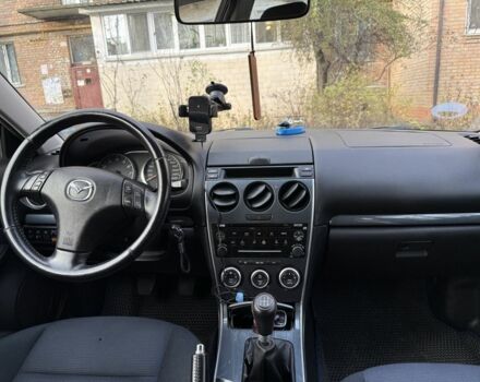 Синій Мазда 6, об'ємом двигуна 1.8 л та пробігом 201 тис. км за 2100 $, фото 7 на Automoto.ua