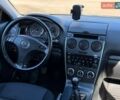 Синий Мазда 6, объемом двигателя 1.8 л и пробегом 231 тыс. км за 3800 $, фото 18 на Automoto.ua