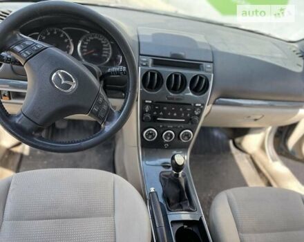 Синий Мазда 6, объемом двигателя 1.8 л и пробегом 330 тыс. км за 2700 $, фото 6 на Automoto.ua