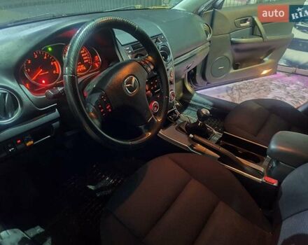 Синий Мазда 6, объемом двигателя 2 л и пробегом 278 тыс. км за 3800 $, фото 5 на Automoto.ua