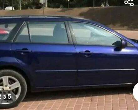 Синий Мазда 6, объемом двигателя 1.8 л и пробегом 156 тыс. км за 6000 $, фото 1 на Automoto.ua