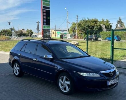 Синий Мазда 6, объемом двигателя 2 л и пробегом 320 тыс. км за 1899 $, фото 3 на Automoto.ua