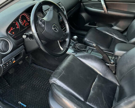Синий Мазда 6, объемом двигателя 2 л и пробегом 212 тыс. км за 5500 $, фото 6 на Automoto.ua