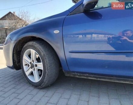 Синій Мазда 6, об'ємом двигуна 2 л та пробігом 346 тис. км за 3650 $, фото 9 на Automoto.ua
