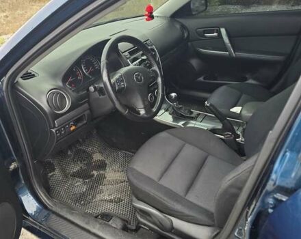 Синий Мазда 6, объемом двигателя 2 л и пробегом 250 тыс. км за 4250 $, фото 2 на Automoto.ua