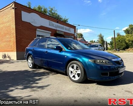 Синий Мазда 6, объемом двигателя 2 л и пробегом 261 тыс. км за 4900 $, фото 2 на Automoto.ua