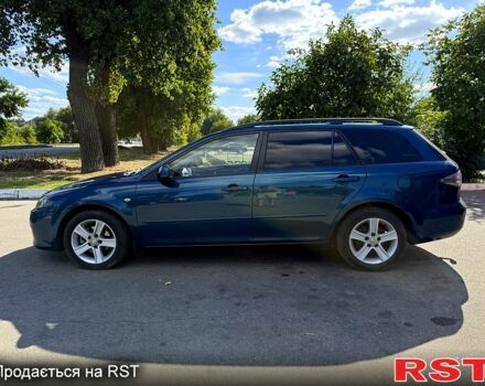 Синий Мазда 6, объемом двигателя 2 л и пробегом 261 тыс. км за 4900 $, фото 1 на Automoto.ua