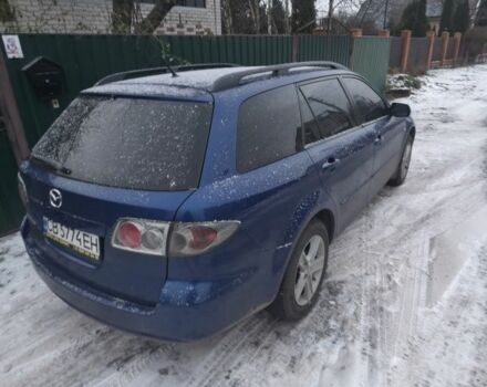 Синій Мазда 6, об'ємом двигуна 2 л та пробігом 243 тис. км за 5600 $, фото 2 на Automoto.ua