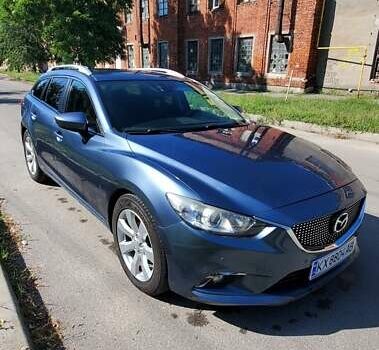 Синій Мазда 6, об'ємом двигуна 2.18 л та пробігом 256 тис. км за 9700 $, фото 12 на Automoto.ua