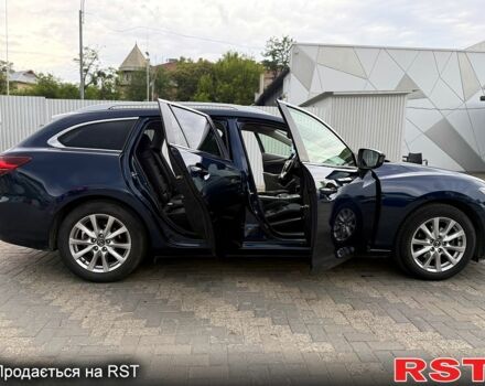 Синій Мазда 6, об'ємом двигуна 2.2 л та пробігом 265 тис. км за 12000 $, фото 4 на Automoto.ua